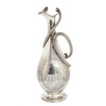 A Victorian silver snake handled ewer and cover, baluster shaped body engraved in the Etruscan style