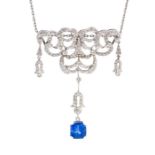 A garland style sapphire and diamond pendant, comprising an open work diamond set pendant of