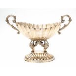A Spanish .915 silver twin handled centrepiece, fluted oval bowl with scroll handles, on two