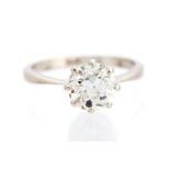 A diamond solitaire ring, the coronet set old cut diamond weighing approx 1.75cts, assessed