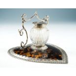 A Victorian heart-shaped silver mounted tortoiseshell inkstand, the silver border with gadroon