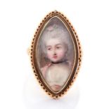 A late 18th century yellow gold navette shaped sentimental ring, set with a portrait miniature of