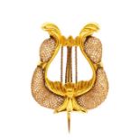 A 19th century gold and hairwork mourning brooch, in the form of a lyre, approx 2cm x 2.5cm, total