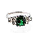 An Art Deco style tsavorite garnet and diamond ring, the cushion cut tsavorite garnet along with