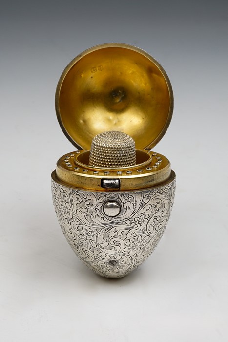 A late Victorian novelty silver egg shaped etui opening to reveal gilt metal interior fitted for - Image 3 of 3