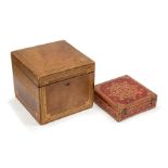 A 19th century silk-lined morocco gilt tooled box, the hinged cover enclosing two removable