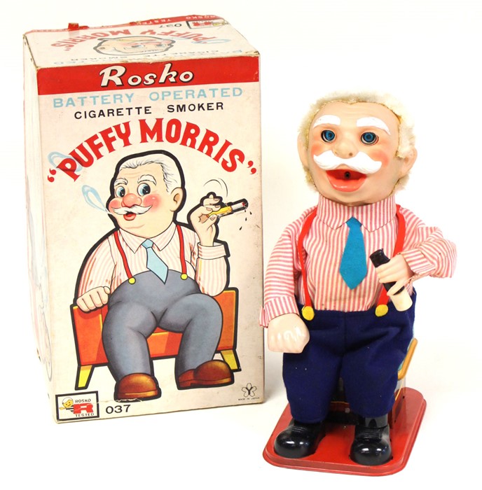 Puffy Morris: A boxed, tinplate, battery operated, Cigarette Smoker 'Puffy Morris', Made by Rosko,