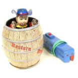Cowboy in a Barrel: A rare, battery operated, tinplate, Cowboy in a Barrel, remote control, Made