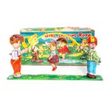 Girl Skipping Rope: A boxed, clockwork, tinplate, Girl Skipping Rope, Made by Tokyo Playthings,