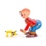 Boy with Walking Dog: A clockwork, tinplate, Mechanical Boy with Walking Dog, Made by Yonezawa,