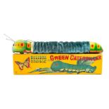 Green Caterpillar: A boxed, battery operated, tinplate and material, Green Caterpillar, remote