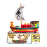 Captain Kidd Pirate Ship: A boxed, battery operated, tinplate, Captain Kidd Pirate Ship, Cap