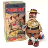 Pistol Pete: A boxed, battery operated, tinplate, Pistol Pete, with remote control, Made by Marisan,