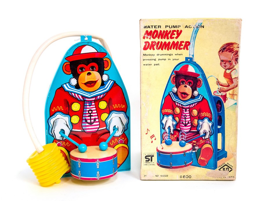 Monkey Drummer: A boxed, water pump action, tinplate, Monkey Drummer, Made by Osaka, Japan (KO),