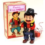 2 Gun Sheriff: A boxed, battery operated, tinplate, Cragstan 2 Gun Sheriff, with remote control,