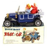 Jolly Old Fashioned Car: A boxed, battery operated, tinplate, Well-Dressed Billy & Betsy Ride On