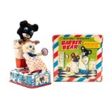 Barber Bear: A boxed, battery operated, tin and plush, Barber Bear, with Moving Comb, Scissors and