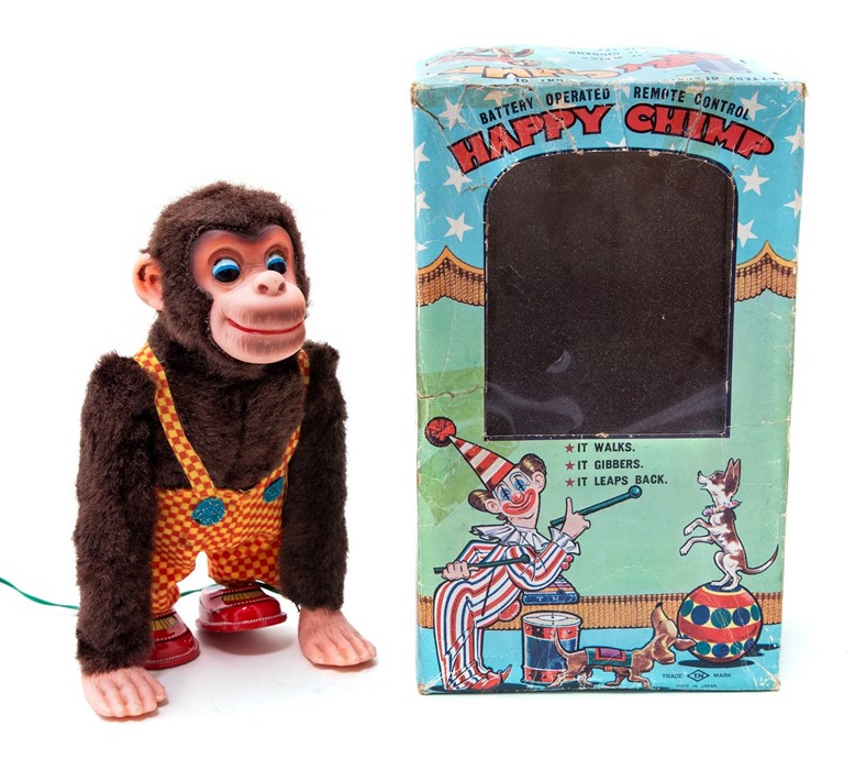 Happy Chimp: A boxed, battery operated, remote control, tin and plush, Happy Chimp, Made by