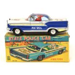State Police Car: A boxed, 1950's, friction powered, State Police Car, Made by Masuya, Japan,