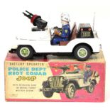 Police Dept Riot Squad: A boxed, battery operated, tinplate, Police Dept Riot Squad Jeep, Made by