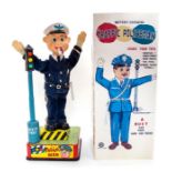 Traffic Policeman: A boxed, battery operated, tinplate, Traffic Policeman, Made by A1, Japan,