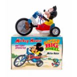 Mickey Mouse: A boxed, battery operated, tinplate and plastic, Mickey Mouse Little Big Wheel, Made