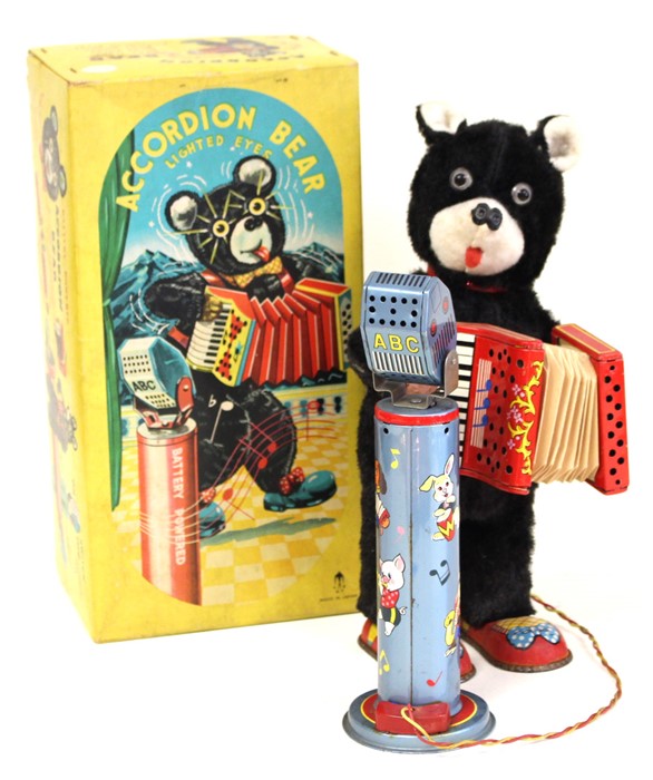 Accordion Bear: A boxed mid-20th century, battery operated, tinplate, Accordion Bear with Lighted