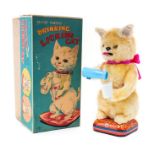 Drinking Licking Cat: A boxed, battery operated, tinplate and fur, Drinking Licking Cat, Made by