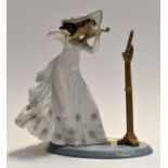 A Lladro study of a Young Lady Violinist.