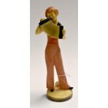 A late 1930's plaster model of a girl playing an accordian