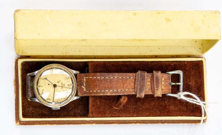 A boxed Omega Gentleman's wristwatch, Swiss made, tan leather strap,