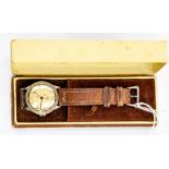 A boxed Omega Gentleman's wristwatch, Swiss made, tan leather strap,