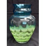 An unnamed art glass vase with bright green and deep clear turquoise colouring.