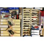A large collection of assorted Lledo and other assorted boxed model cars, contained within three