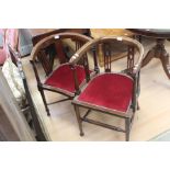 Two similar Edwardian mahogany hall chairs (2)