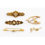 Four Edwardian brooches - comprising two 9ct, approx 3.9gms gross; one with Kangaroo and wishbone
