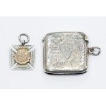 A George V silver vesta, Birmingham 1911, approx 23.5 grams; a silver fob, Birmingham 1913, 7