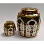 A Royal Crown Derby 1228 Old Imari solid gold band ginger jar and cover along with smaller jar and