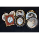A collection of 19th Century miniature items in yellow metal frames