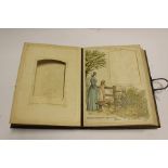 A Victorian leather photograph album