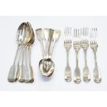 A set of nine Victorian silver fiddle pattern dessert spoons, S. S London, 1873 together with four