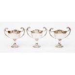 A set of three George V silver two handled loving cups, plain bodies, by James Deakin & Sons,
