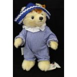 A Steiff Andy Pandy Teddy Bear with original tag and button in ear