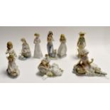 8 Lladro figures of girls, most with encrusted flower decoration. Condition: 3 of the standing girls