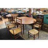 A G-plan style dining suite table & six rush seated chairs (2x carvers + 4 chairs)