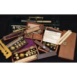 A collection of Victorian and early 20th Century scales plus hydrometers, all cased