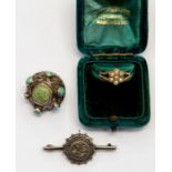 A Victorian yellow metal and seed pearl daisy head ring in ring box, together with a turquoise and