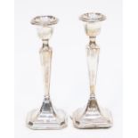 A pair of Chester silver candlesticks, by James Deakin & Sons, 1915,  A/F