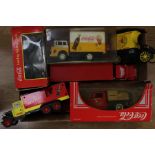 Coca-Cola collection of diecast and plastic vehicles including Ertl tractor trailer, Ford Lorry, two
