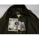 David Bowie - Barbour jacket. Sound & Vision Tour 1991, sewn on patch and signed inside with tour